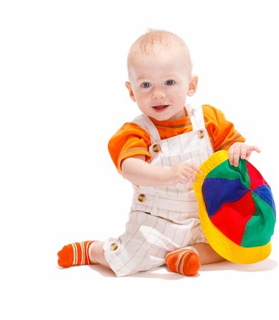 Cute baby boy with colorful funny hat Foto de stock - Super Valor sin royalties y Suscripción, Código: 400-04637376