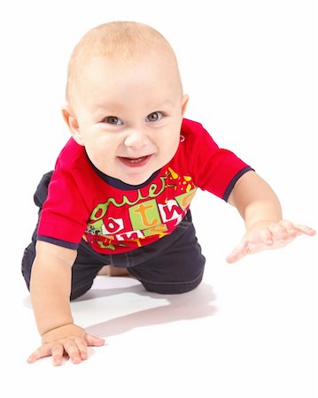 Sweet baby boy crawling, isolated Foto de stock - Super Valor sin royalties y Suscripción, Código: 400-04637371