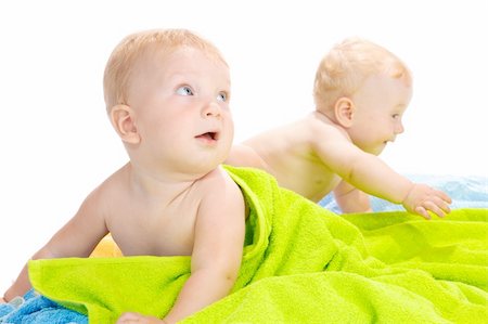 Two lovely crawling babies, isolated Stock Photo - Budget Royalty-Free & Subscription, Code: 400-04637382