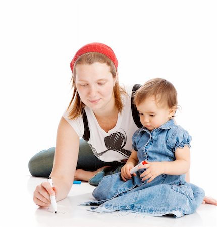 Mother and daughter drawing, isolated Stock Photo - Budget Royalty-Free & Subscription, Code: 400-04637431