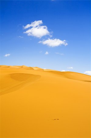 simsearch:400-05192544,k - sand dunes and cumulus clouds over them Stock Photo - Budget Royalty-Free & Subscription, Code: 400-04637491