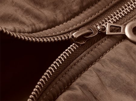 sepia toned jacket fragment with metal zipper Stock Photo - Budget Royalty-Free & Subscription, Code: 400-04638069