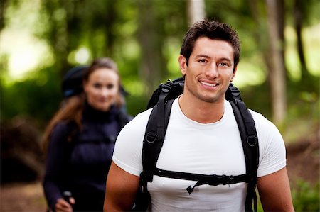 A portrait of a male hiking in the forest with a female Stock Photo - Budget Royalty-Free & Subscription, Code: 400-04638295