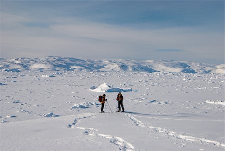 People on snow-shoes with Sermilik Fjord's ice field in background Stock Photo - Budget Royalty-Free & Subscription, Code: 400-04638544