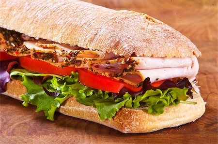 panini sandwich with lettuce tomato and turkey Photographie de stock - Aubaine LD & Abonnement, Code: 400-04638717