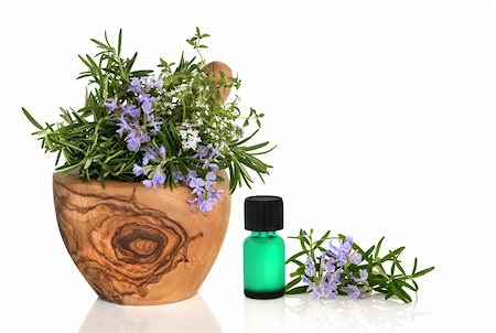 simsearch:400-07303169,k - Rosemary and thyme herbs in flower in an olive wood mortar with pestle with an aromatherapy oil glass bottle and leaf sprig isolated over white background. Stock Photo - Budget Royalty-Free & Subscription, Code: 400-04638952