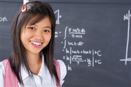 smart asian math - Female student pose in front of blackboard Stock Photo - Budget Royalty-Free & Subscription, Code: 400-04639375