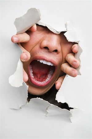 Male mouth screaming from cracked wall - one of the breakthrough series Stock Photo - Budget Royalty-Free & Subscription, Code: 400-04639553