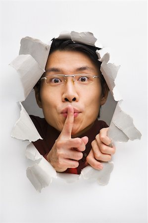 Man from cracked wall tell you to be quiet Stock Photo - Budget Royalty-Free & Subscription, Code: 400-04639593