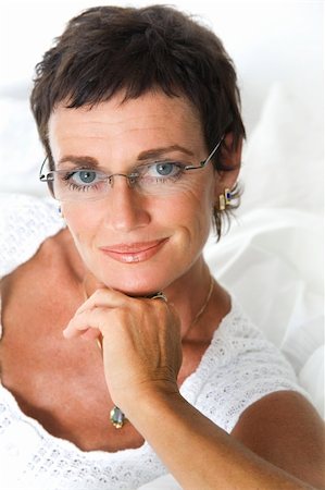 Portrait of an attractive mature woman smiling Stock Photo - Budget Royalty-Free & Subscription, Code: 400-04639958