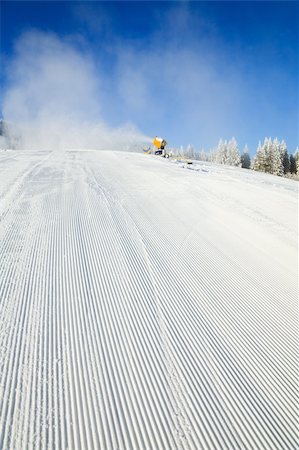 simsearch:400-04319458,k - winter mountain landscape with Snow Making Machine (snow cannon) on Bukovel ski resort (Ukraine) Stock Photo - Budget Royalty-Free & Subscription, Code: 400-04639979