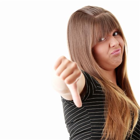 disapproving black woman - Young woman showing thumbs down isolated Stock Photo - Budget Royalty-Free & Subscription, Code: 400-04630603