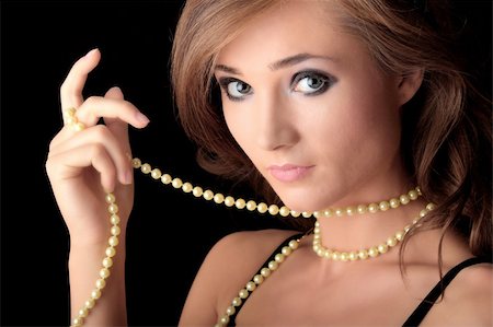 simsearch:400-07822212,k - The dreaming woman with a pearl necklace Fotografie stock - Microstock e Abbonamento, Codice: 400-04630614