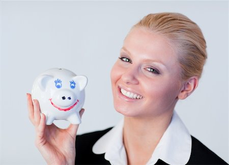 Young Business woman holding a piggy Bank Stock Photo - Budget Royalty-Free & Subscription, Code: 400-04630953