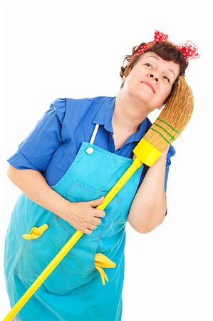 dance broom - Cleaning lady daydreaming about better times.  Isolated on white. Stock Photo - Budget Royalty-Free & Subscription, Code: 400-04631497