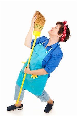 simsearch:400-04132270,k - Lonely housekeeper dancing with her broom.  Full body isolated on white. Stockbilder - Microstock & Abonnement, Bildnummer: 400-04631509