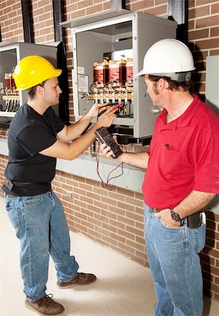 distribution center - Technical school student learning how to repair industrial power distribution center with the help of an instructor. Stock Photo - Budget Royalty-Free & Subscription, Code: 400-04631500