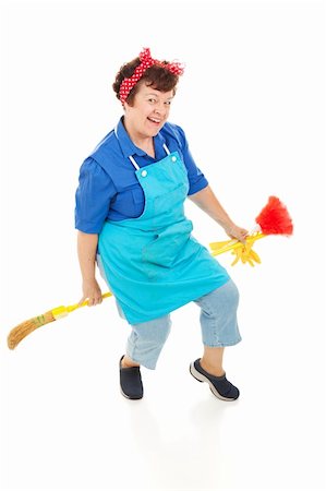 Happy, smiling maid riding her broom like a witch. Full body isolated. Stock Photo - Budget Royalty-Free & Subscription, Code: 400-04631514