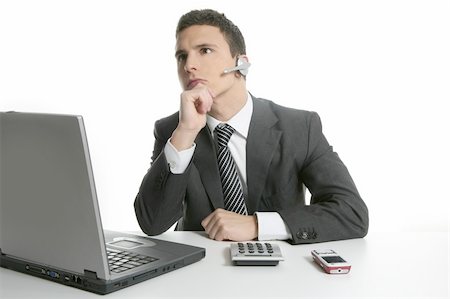 simsearch:400-04124882,k - Businessman with headphones and laptop on help center Stock Photo - Budget Royalty-Free & Subscription, Code: 400-04631559