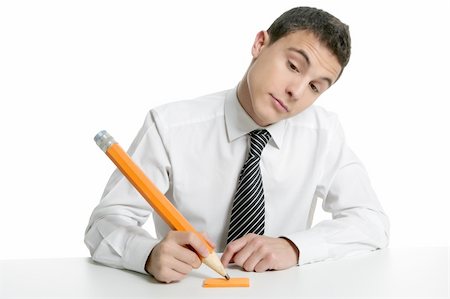 Young businessman student thinking gesture with huge giant pencil Stock Photo - Budget Royalty-Free & Subscription, Code: 400-04631570