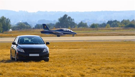 show aircraft - Black car front view and airplane Stock Photo - Budget Royalty-Free & Subscription, Code: 400-04631769