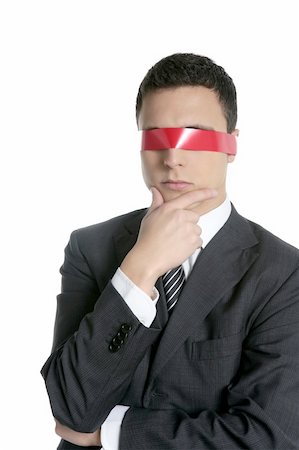 Red tape blindfold businessman isolated on white background Stock Photo - Budget Royalty-Free & Subscription, Code: 400-04631810