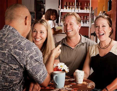 Four adult friends meeting in a coffee house Stock Photo - Budget Royalty-Free & Subscription, Code: 400-04631857