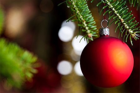 round ornament hanging of a tree - Photography of baubles connected with Christmas time and Christmas tree. Stock Photo - Budget Royalty-Free & Subscription, Code: 400-04632131