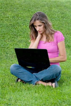 simsearch:6109-06003526,k - Woman with laptop sit relaxed green grass Stock Photo - Budget Royalty-Free & Subscription, Code: 400-04632738