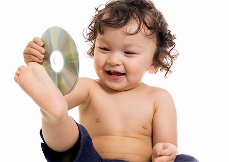 Baby playing with disk,isolated ona white background. Stock Photo - Budget Royalty-Free & Subscription, Code: 400-04632979
