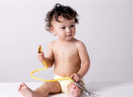 simsearch:400-06416929,k - Baby at the doctor,playing with stetoscope. Stock Photo - Budget Royalty-Free & Subscription, Code: 400-04632983