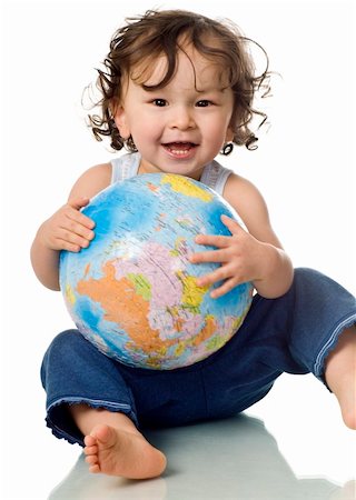 Baby with puzzle globe,isolated on a white background. Stock Photo - Budget Royalty-Free & Subscription, Code: 400-04632995