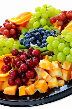Platter of assorted fresh fruit and cheese Photographie de stock - Aubaine LD & Abonnement, Code: 400-04633801