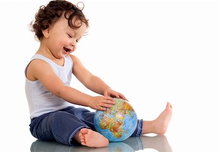 simsearch:400-05174344,k - Child playing with globe,isolated on a white background. Foto de stock - Super Valor sin royalties y Suscripción, Código: 400-04633934