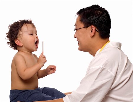 paediatrician (male) - Child at the doktor, playing with medical equipment. Stock Photo - Budget Royalty-Free & Subscription, Code: 400-04633951