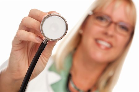 simsearch:400-05192324,k - Attractive Female Doctor Holding Stethoscope Isolated on a White Background. Stock Photo - Budget Royalty-Free & Subscription, Code: 400-04644046