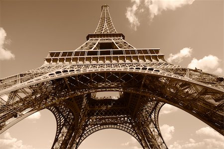paris sepia - A view from below the Eiffel Tower, in sepia Stock Photo - Budget Royalty-Free & Subscription, Code: 400-04644059