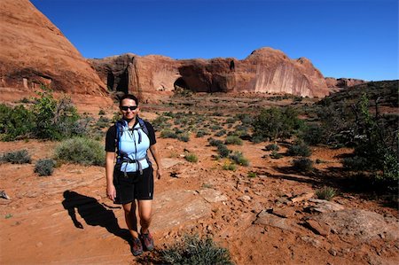 simsearch:400-04044871,k - Woman hiking the desert near Moab Photographie de stock - Aubaine LD & Abonnement, Code: 400-04644743