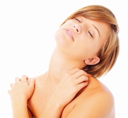 Woman massaging her neck and shoulders, from a complete series of photos. Fotografie stock - Microstock e Abbonamento, Codice: 400-04644923