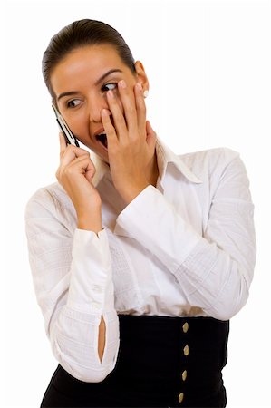 attractive businesswoman looking shoked about the news recieved by phone Stock Photo - Budget Royalty-Free & Subscription, Code: 400-04644931