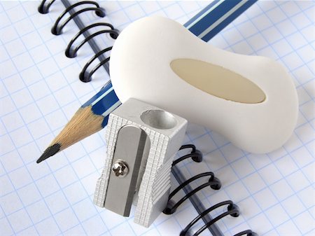 simsearch:400-05206224,k - pencil and eraser with sharpener on the spiral notepad Stockbilder - Microstock & Abonnement, Bildnummer: 400-04645343