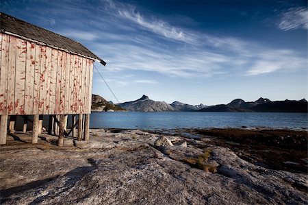 red barn in field - A boat house on the coast of northern Norway Stock Photo - Budget Royalty-Free & Subscription, Code: 400-04646053