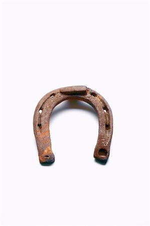 old rusty horseshoe isolated on white background - clipping path Stock Photo - Budget Royalty-Free & Subscription, Code: 400-04646142