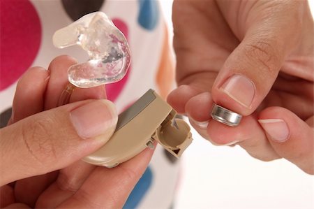details hearing aid and battery in closeup Stock Photo - Budget Royalty-Free & Subscription, Code: 400-04646471