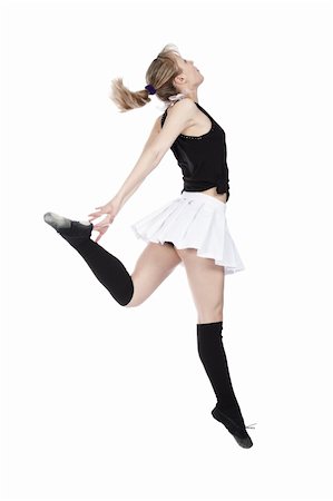 female dancers lifted - Young woman break dancing isolated against a white background. Stock Photo - Budget Royalty-Free & Subscription, Code: 400-04646930