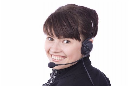 simsearch:400-04004131,k - Helpdesk or support operator. Successful  businessman is speaking over the headset with a microphone. How can i help you? Face of young charming confident woman with headset. Isolated over white background. Foto de stock - Super Valor sin royalties y Suscripción, Código: 400-04646972