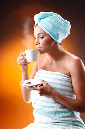 Young woman having a morning coffee. Meant to match Hot coffee, sisal sack and grains collection. Stock Photo - Budget Royalty-Free & Subscription, Code: 400-04647293