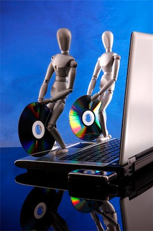 simsearch:400-04971966,k - A couple of dummies start, use, fix and close a laptop Stock Photo - Budget Royalty-Free & Subscription, Code: 400-04647451