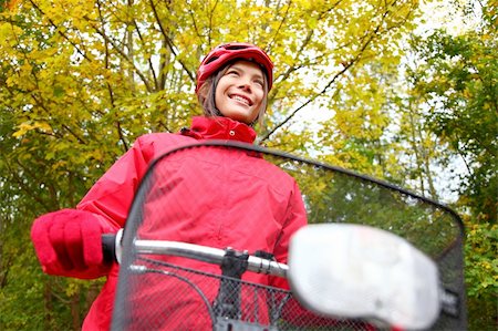 simsearch:400-06922980,k - Biking. Woman in red on bike in autumn forest. Stock Photo - Budget Royalty-Free & Subscription, Code: 400-04647547