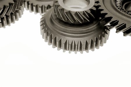 Steel gears close-up on white background Stock Photo - Budget Royalty-Free & Subscription, Code: 400-04647735